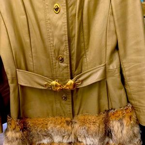 Fur trimmed leather jacket.